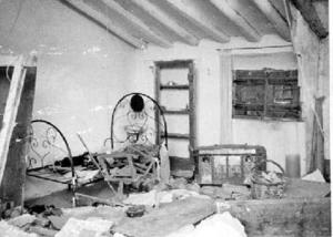 Danys causats pels combats a l'interior d'una vivenda a Siétamo, al front d'Osca