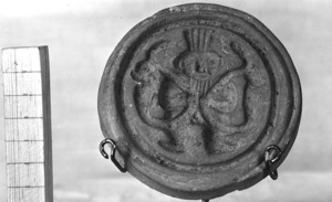 Placa circular dels segles VI-V a.C.